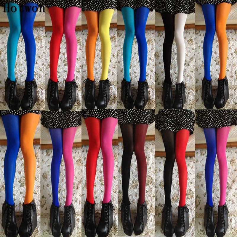 Pantimedias Patchwork con una pierna de distinto color Color : Azul y Fucsia|Negro y Blanco|Negro y Naranja|Amarillo y Fucsia|Violeta y Fucsia|Celeste y Azul|Negro y Bordeaux|Naranja y Amarillo|Rojo y Fucsia|Azul y Naranja 